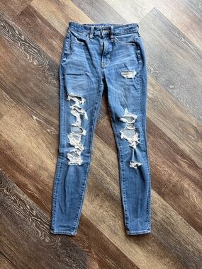 American Eagle Outfitters Distressed Super hi-rise jegging size 0
